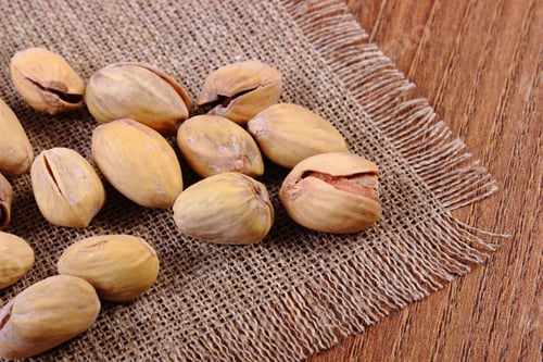 Preview: Roasted Pistachio Nuts On Wooden Table Background, Healthy Food And Nutrition