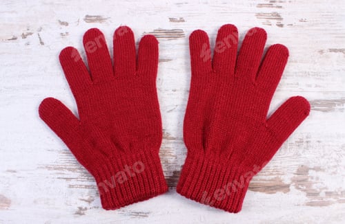 Preview: Pair Of Woolen Gloves For Woman On Old Rustic Wooden Background, Womanly Accessories, Warm Clothing