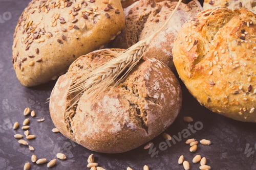 Preview: Fresh Baked Wholegrain Rolls With Seeds And Ears Of Rye Or Wheat Grain. Vintage Photo