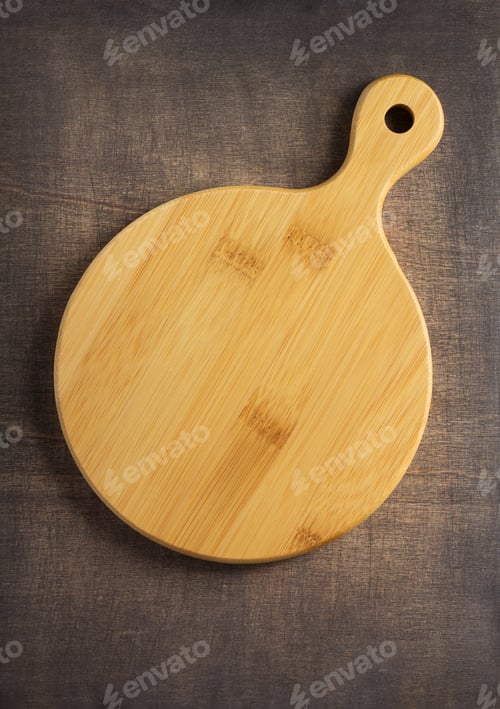 Preview: Pizza Or Bread Cutting Board At Wooden Table, Top View