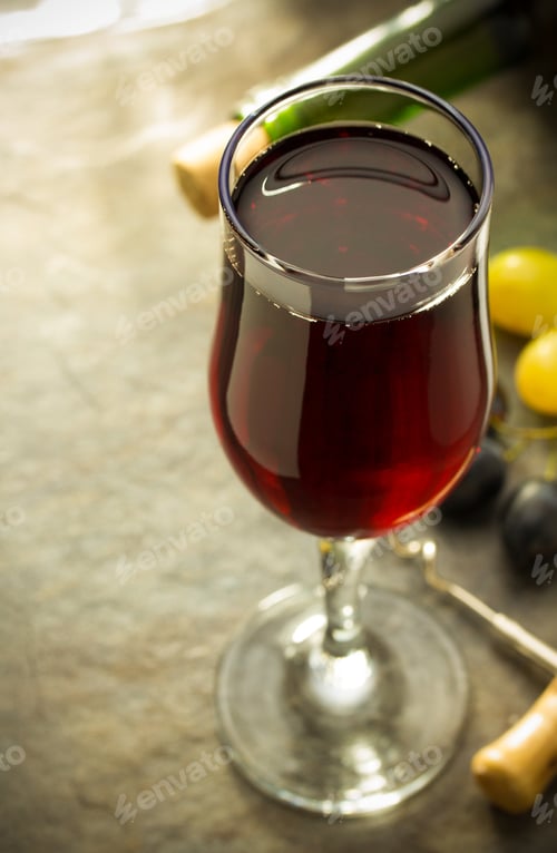 Preview: Wine Glass And Grapes On Table