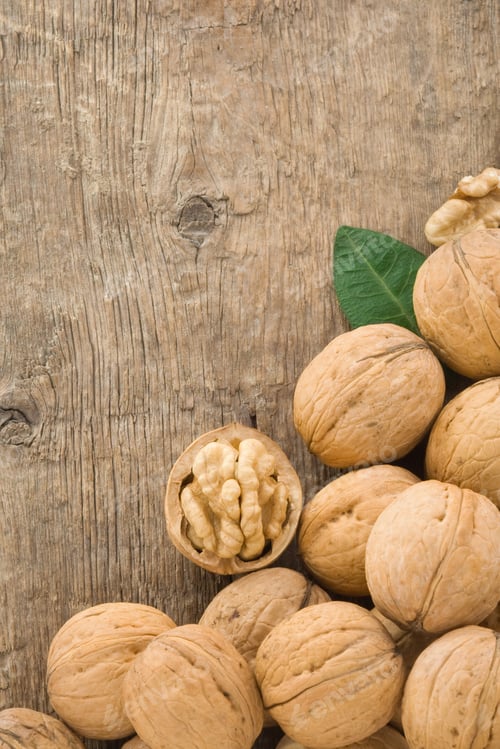 Preview: Walnuts Fruit On Wood Background Texture