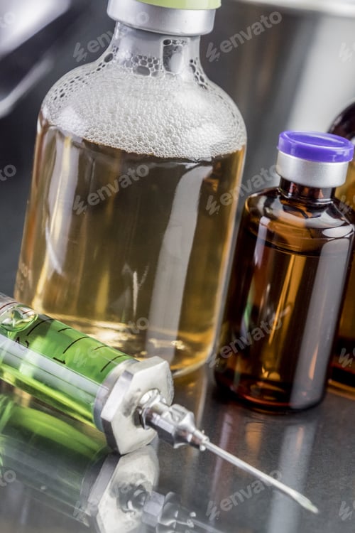 Preview: Several Vials And Syringe In Laboratory, Conceptual Image
