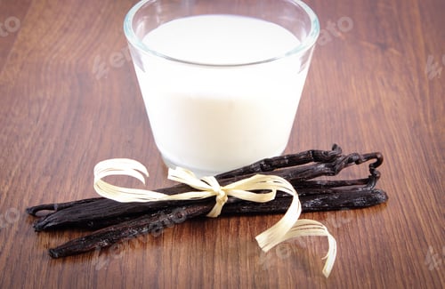 Preview: Fresh Fragrant Vanilla Sticks Pods And Glass Of Milk On Wooden Board. Seasoning And Ingredients For