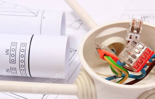 Preview: Copper Wire Connections In Electrical Box And Rolls Of Electrical Diagrams On Construction Drawing