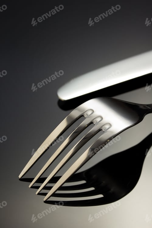 Preview: Knife And Fork On Black Background