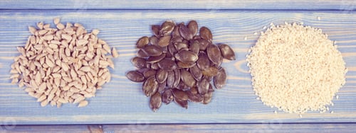 Preview: Vintage Photo, Sunflower, Pumpkin And Sesame Seeds On Wooden Boards, Concept Of Healthy Nutrition