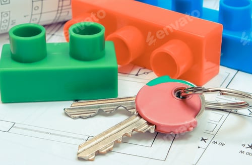 Preview: Home Keys And Colorful Building Blocks On Electrical Construction Drawing Of House. Concept Of