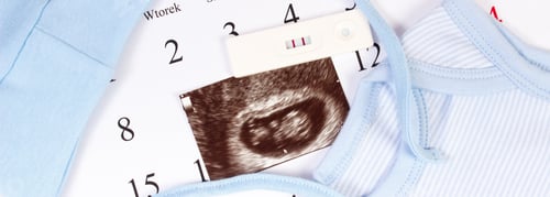 Preview: Pregnancy Test With Positive Result, Ultrasound Scan Of Baby And Clothing For Newborn On Calendar