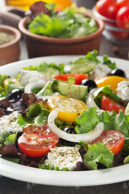 Preview: Fresh Greek Salad In Plate On Stone Table
