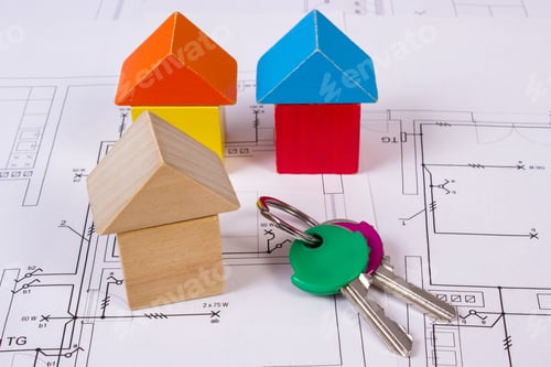 Preview: Houses Shape Made Of Wooden Blocks And Home Keys Lying On Electrical Construction Drawings Of