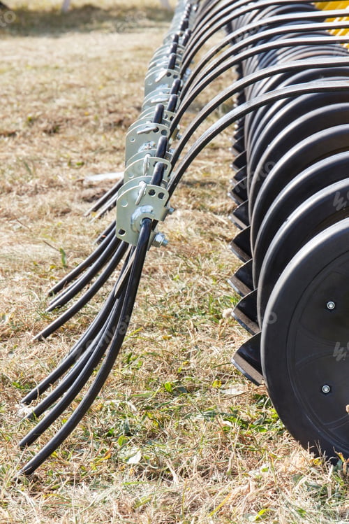 Preview: Part And Detail Of Agricultural Rotary Harrow On Cultivated Field. Modern Technology In Agriculture