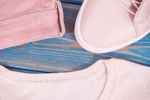 Preview: Womanly Clothing And Accessories On Old Boards, Pink Leather Shoes, Sweater And Pants