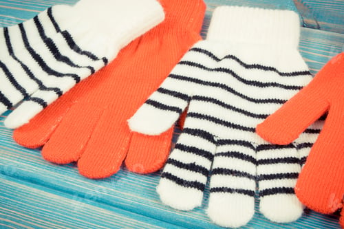 Preview: Red With Black And White Gloves For Woman Made Of Cotton Or Wool On Blue Boards, Warm Clothing For