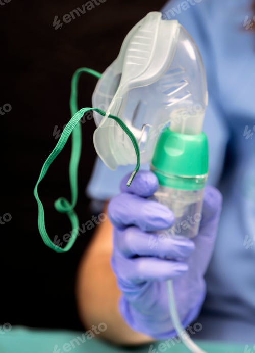 Vista previa: Nurse Prepares Oxygen Mask In Hospital, Conceptual Image