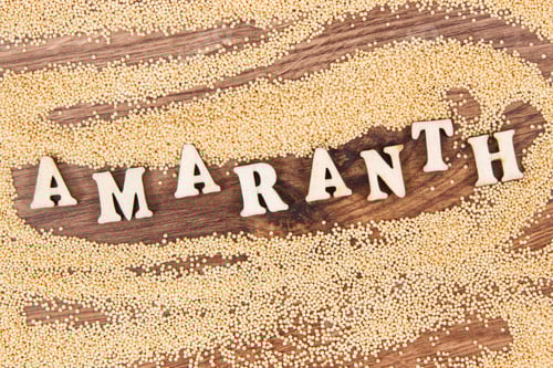 Preview: Amaranth Seeds Forming Word on a Rustic Table