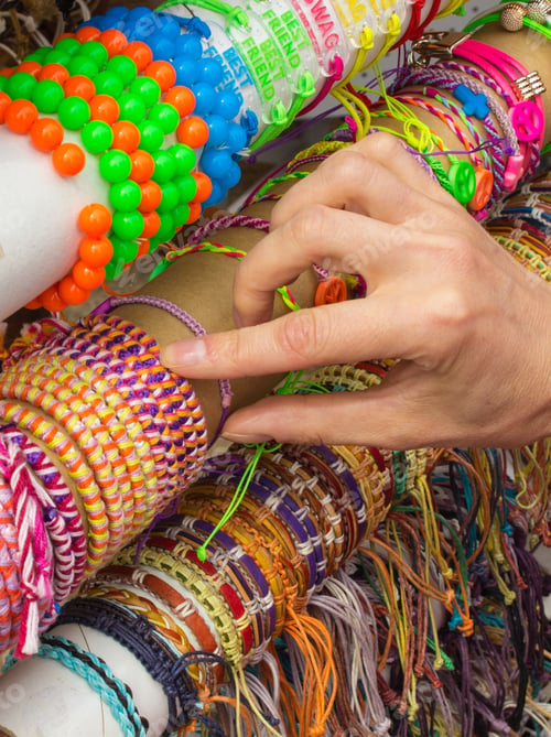 Preview: Hand Of Woman With Colorful Bracelets, Shopping Jewelry And Womanly Accessories On Stall At The