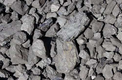 Preview: Heap Of Large And Black Coal Lumps Prepared For Winter In Sunny Day