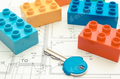 Preview: Colorful Building Blocks And Home Keys Lying On Construction Drawing Of House. Building House