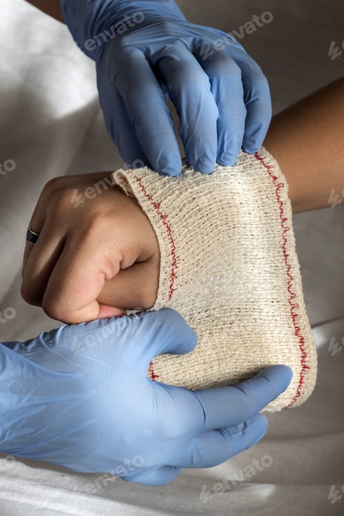 Preview: Close-Up Of A Nurse Tying Bandage On Patient'S Foot