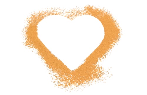 Preview: Closeup Of Heart Of Orange Powder Cinnamon Isolated On White Background