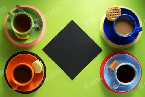 Preview: Cup Of Coffee And Tea At Abstract Green Background
