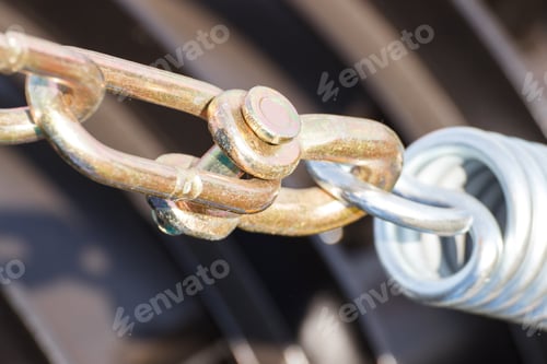 Preview: Closeup Of Steel Spring On Industrial Or Agricultural Machine, Detail And Part Of Hydraulic Or