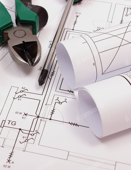 Preview: Rolls Of Diagrams, Metal Pliers And Screwdriver On Electrical Construction Drawing Of House, Work