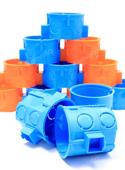 Preview: Blue And Orange Plastic Electrical Boxes On White Background, Components For Use In Electrical