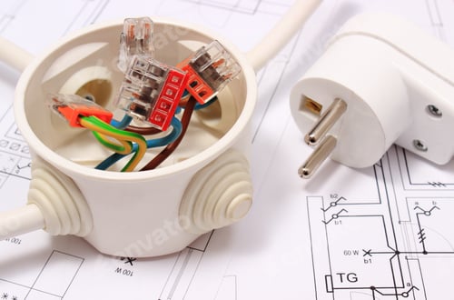 Preview: Copper Wire Connections In Electrical Box And Electric Plug Lying On Construction Drawing Of House