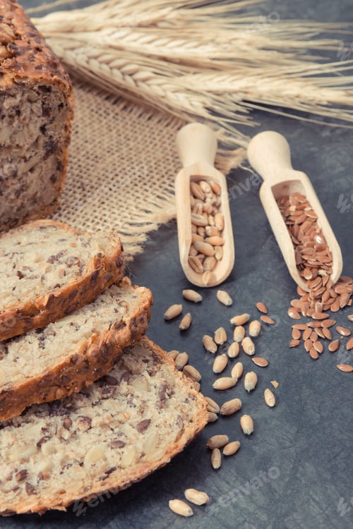 Preview: Fresh Baked Wholegrain Bread For Breakfast, Ingredients For Baking And Ears Of Rye Or Wheat Grain