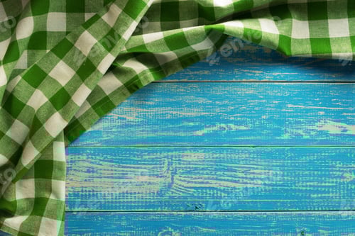 Preview: Green Checked Cloth on Weathered Blue Wood Background