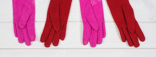 Preview: Colorful Woolen Womanly Gloves On White Boards, Warm Clothing For Autumn Or Winter