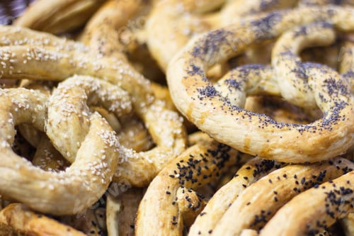 Preview: Heap Of Crunchy Salted Pretzels Or Cookies With Sesame And Chia Seeds. Concept Of Restriction