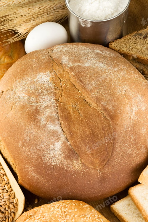 Preview: Bread And Bakery Products On Wood Background