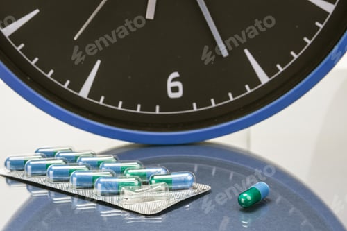 Preview: Pills And Clock Over White Background, Health Care Concept