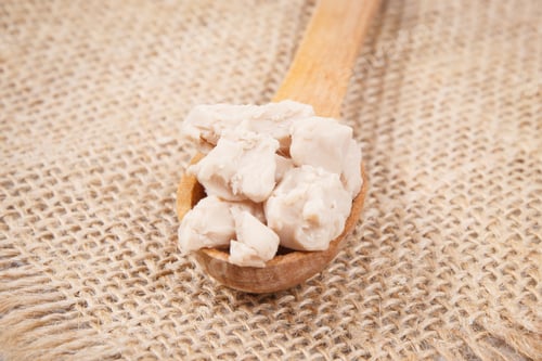 Preview: Fresh Dry Crumbled Yeast On Wooden Spoon For Baking Different Dough Or Bread