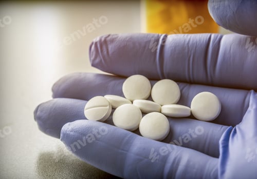 Preview: Doctor Supports In Its Hand Some White Pills