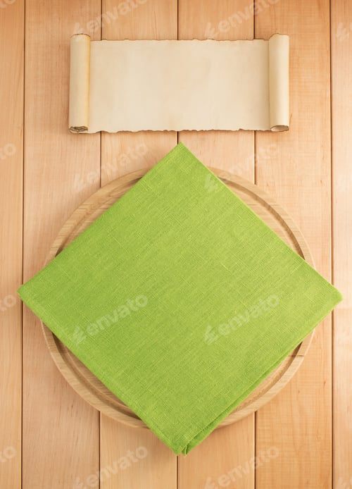 Preview: Napkin At Cutting Board On Wooden Background