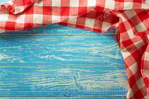 Preview: Red and White Checkered Cloth on Blue Wooden Table