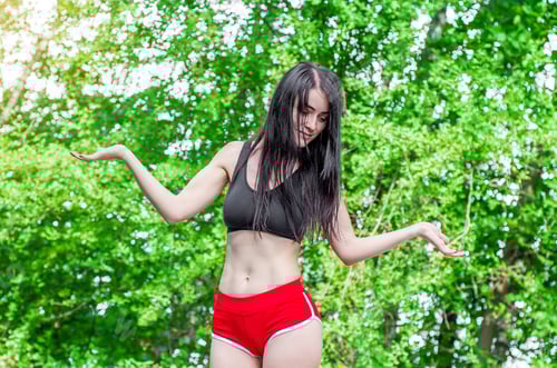 Preview: Active Woman Posing Outdoors in Sportswear