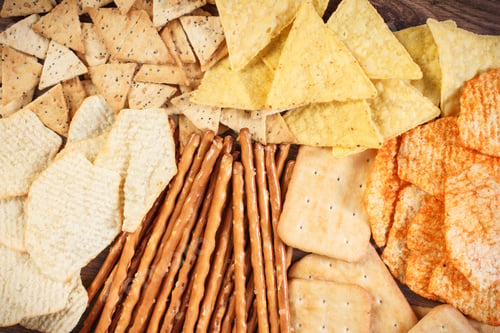 Preview: Heap Of Crunchy Potato Crisps, Breadsticks And Cookies, Concept Of Restriction Eating Unhealthy And