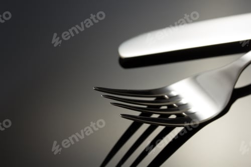 Preview: Knife And Fork On Black Background