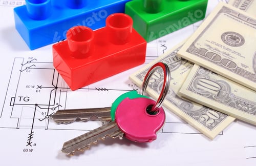 Preview: Heap Of Banknotes, Home Keys And Plastic Colorful Building Blocks Lying On Construction Drawing