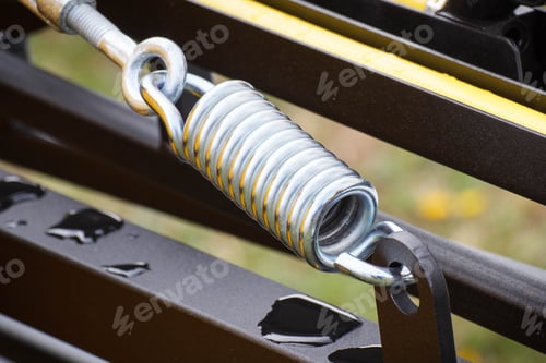 Preview: Big And Hard Steel Spring As Part And Detail Of Industrial Or Agricultural Machine. Technology
