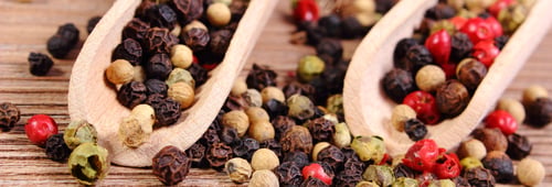 Preview: Heap Of Fresh Colored Pepper With Wooden Spoon Lying On Wooden Table, Seasoning For Cooking
