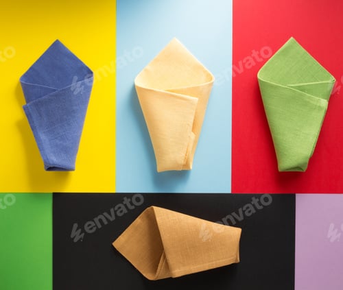 Preview: Folded Napkin At Abstract Colorful Background
