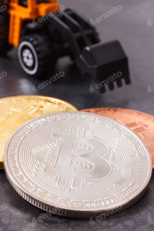 Preview: Bitcoins And Miniature Excavator, Symbol Of Electronic Virtual Money And Mining Cryptocurrency