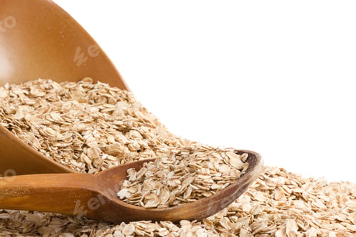 Preview: Oat Flakes And Wood Spoon In Ceramic Plate Isolated On White Background