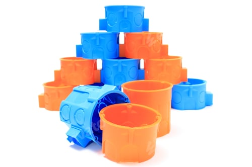 Preview: Blue And Orange Plastic Electrical Boxes On White Background, Components For Use In Electrical